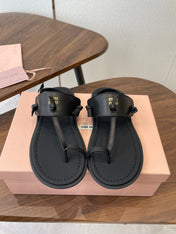 MIUMIU 26S FLIP FLOPS IN BLACK CALFSKIN