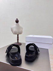 CELINE 25S FLAT SANDALS ARC DE TRIOMPHE IN BLACK CALFSKIN AND CANVAS