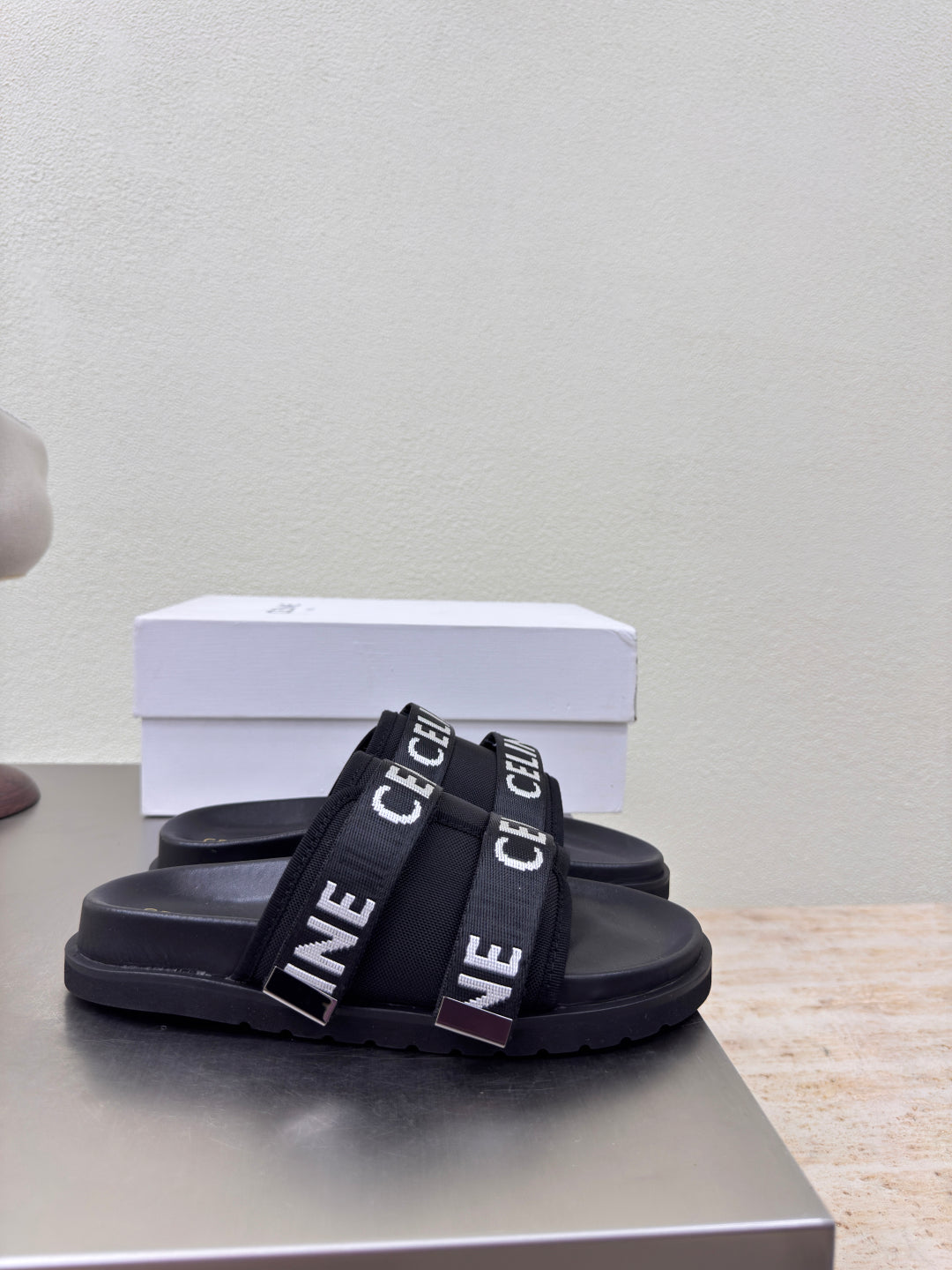 CELINE 25S FLAT SANDALS ARC DE TRIOMPHE IN BLACK CALFSKIN AND CANVAS