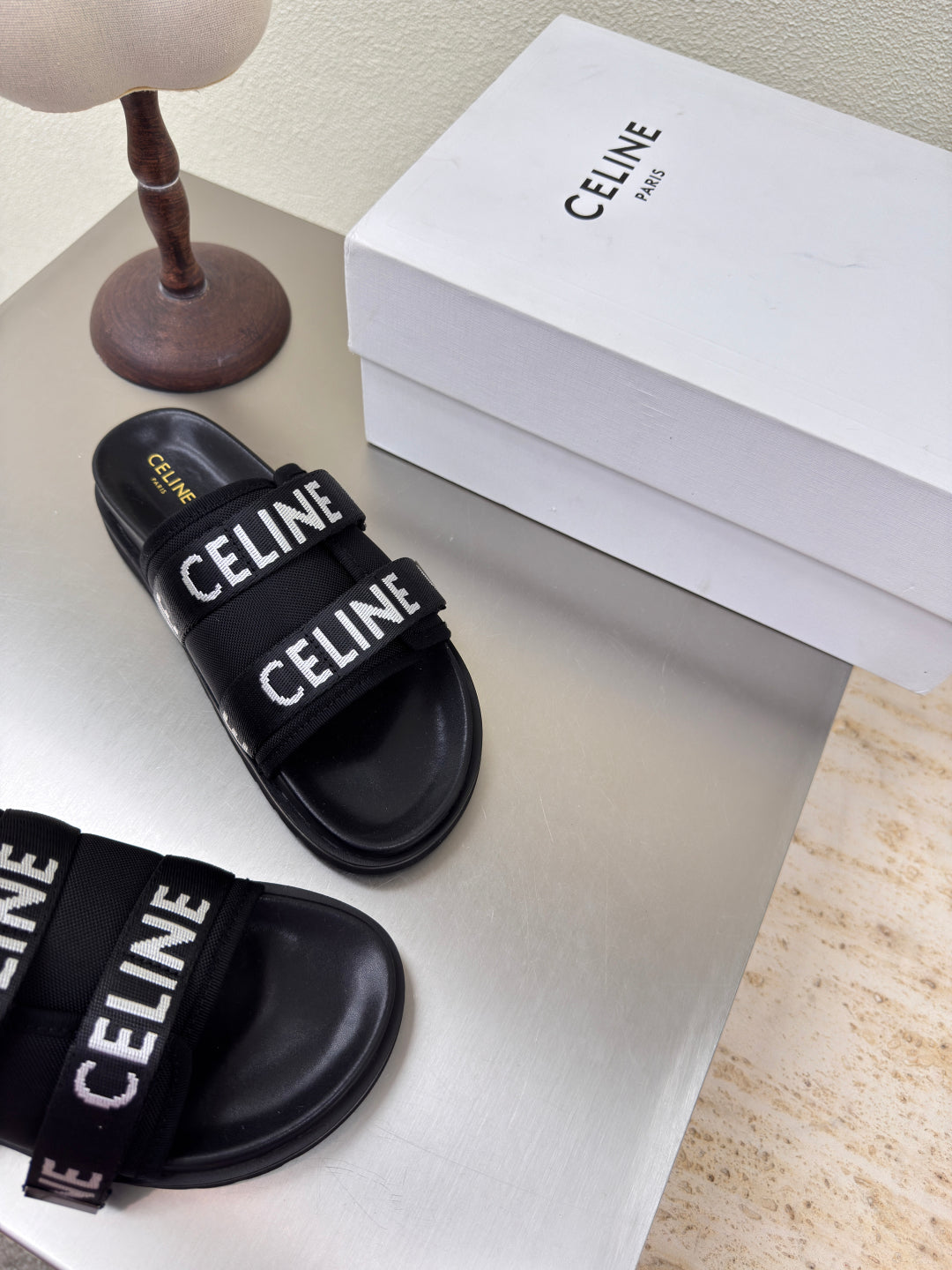 CELINE 25S FLAT SANDALS ARC DE TRIOMPHE IN BLACK CALFSKIN AND CANVAS