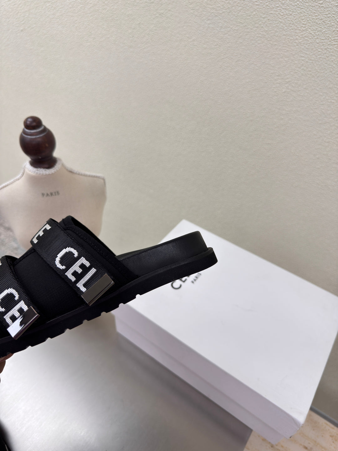 CELINE 25S FLAT SANDALS ARC DE TRIOMPHE IN BLACK CALFSKIN AND CANVAS