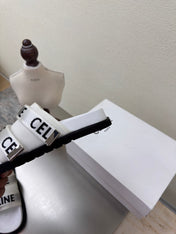 CELINE 25S FLAT SANDALS ARC DE TRIOMPHE IN WHITE CALFSKIN AND CANVAS