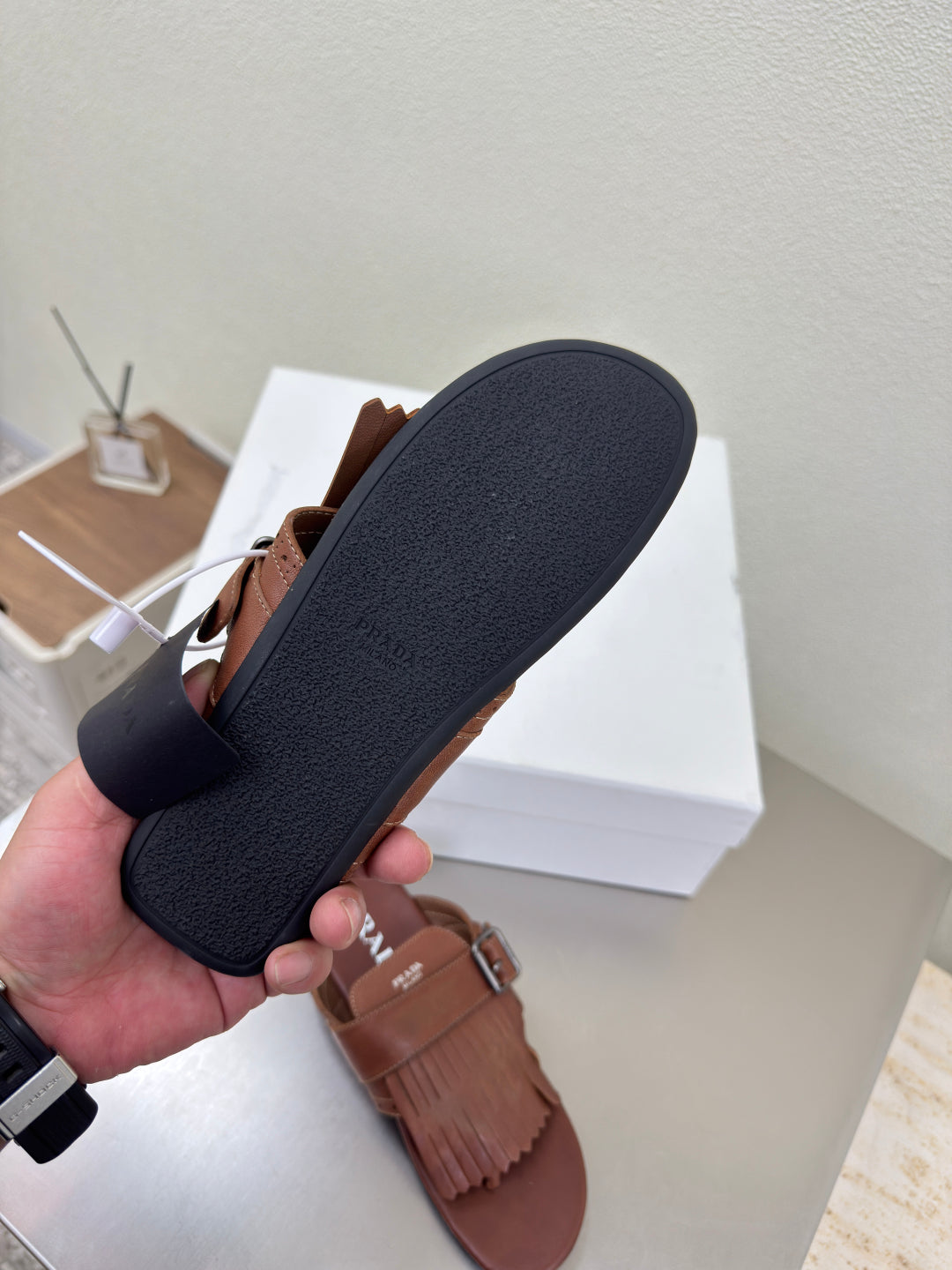 PRADA 25S SHUFFLE LEATHER THONG SANDALS IN SIENNA CALFSKIN