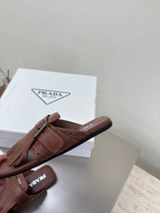 PRADA 25S SHUFFLE LEATHER THONG SANDALS IN SIENNA CALFSKIN