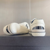 CHANEL 25S SNEAKERS WITH PATENT TOE 20MM IN WHITE CALFSKIN