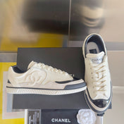 CHANEL 25S SNEAKERS WITH PATENT TOE 20MM IN WHITE CALFSKIN