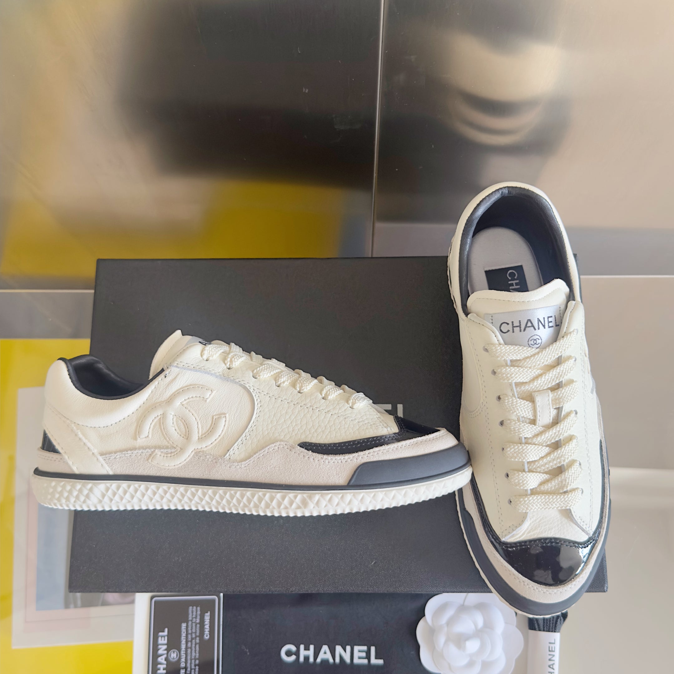 CHANEL 25S SNEAKERS WITH PATENT TOE 20MM IN WHITE CALFSKIN