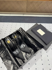 L'ENTRACTE SLINGBACK PUMPS IN BLACK SATIN