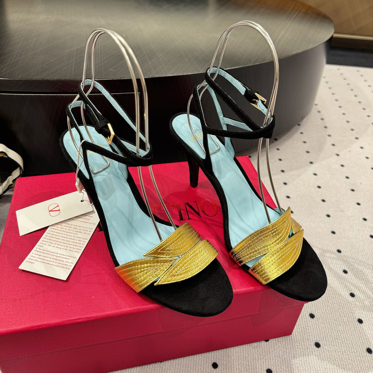 VLTN HIGH SANDAL 25S 60 MM IN BLACK SUEDE AND GOLD CALFSKIN