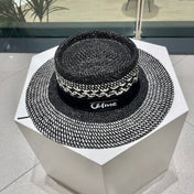 WIDE BRIM HAT MODEL 652048 IN BLACK AND WHITE WOVEN STRAW