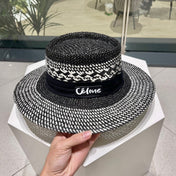 WIDE BRIM HAT MODEL 652048 IN BLACK AND WHITE WOVEN STRAW