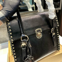 STUDDED TOP HANDLE BAG 33 IN BLACK SMOOTH CALFSKIN