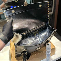STUDDED TOP HANDLE BAG 33 IN BLACK SMOOTH CALFSKIN