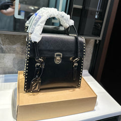 STUDDED TOP HANDLE BAG 33 IN BLACK SMOOTH CALFSKIN