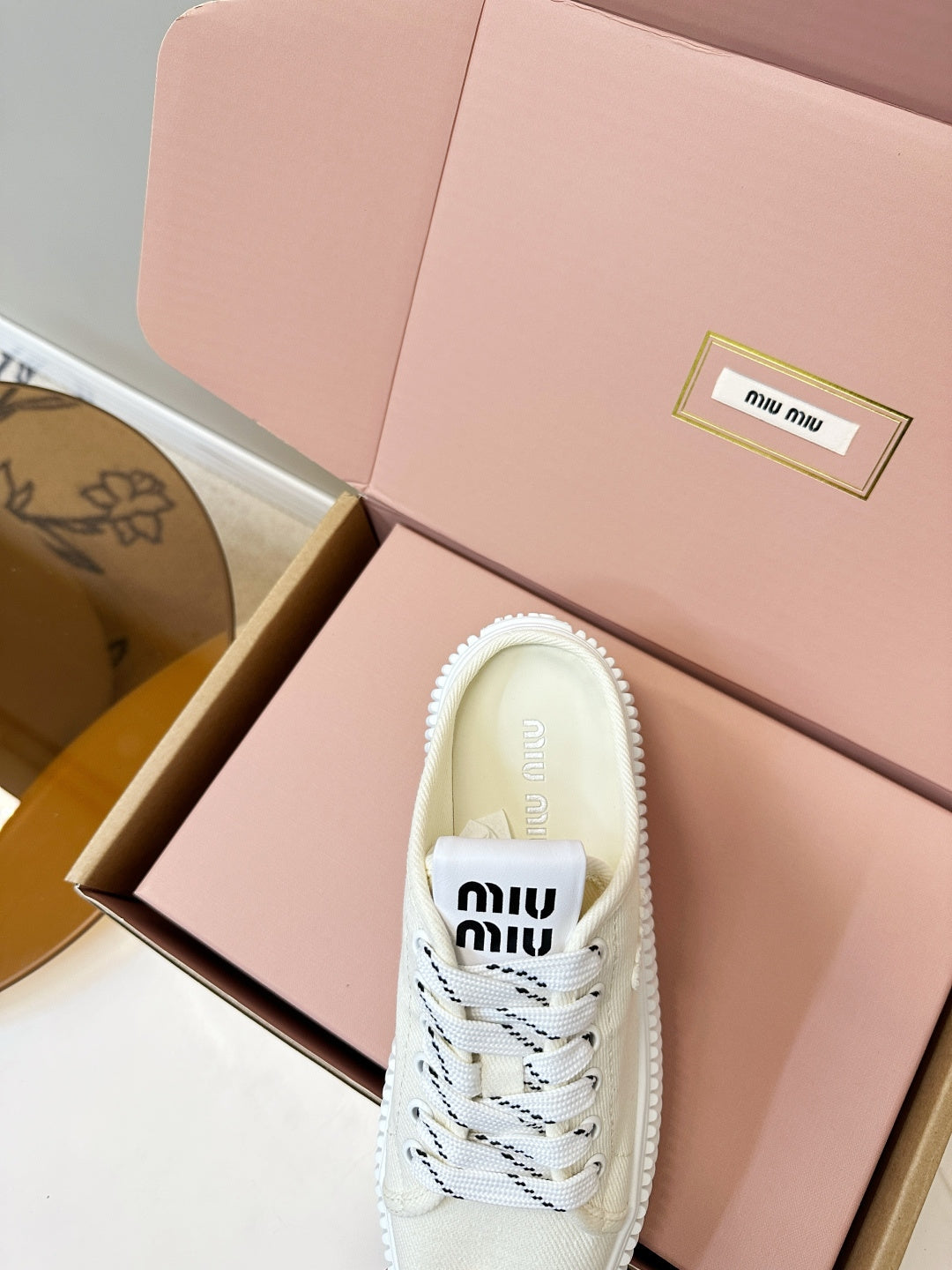 MIUMIU 26S SNEAKER MULES IN LIGHT YELLOW CANVAS