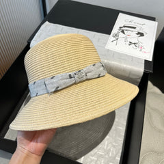 STRAW BUCKET HAT IN BEIGE WITH RIBBON BOW 673979