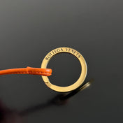 BOTTEGA VENETA 25S LOOP BAG 19 IN BURNT ORANGE RAFFIA AND CALFSKIN