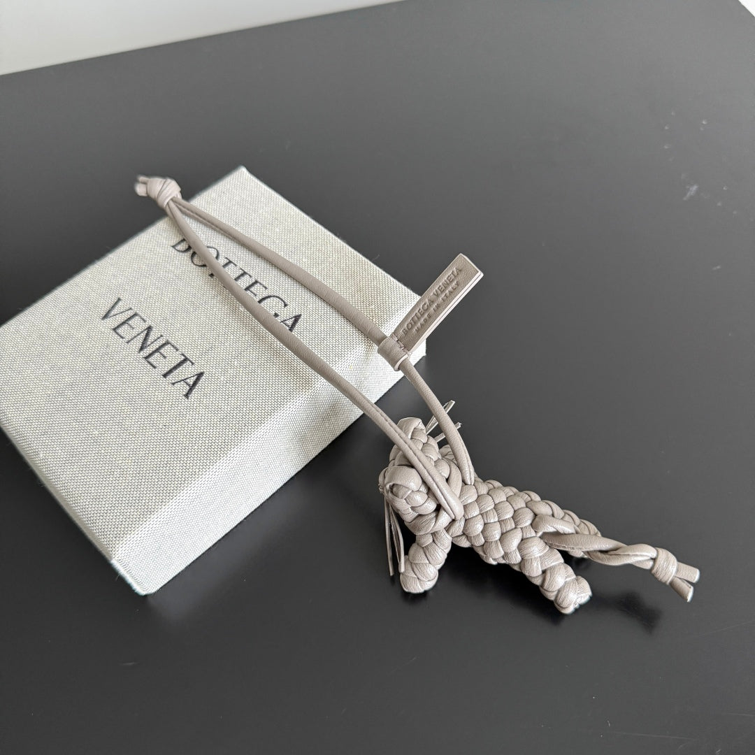 BOTTEGA VENETA 25S CAT CHARM IN GREIGE CALFSKIN