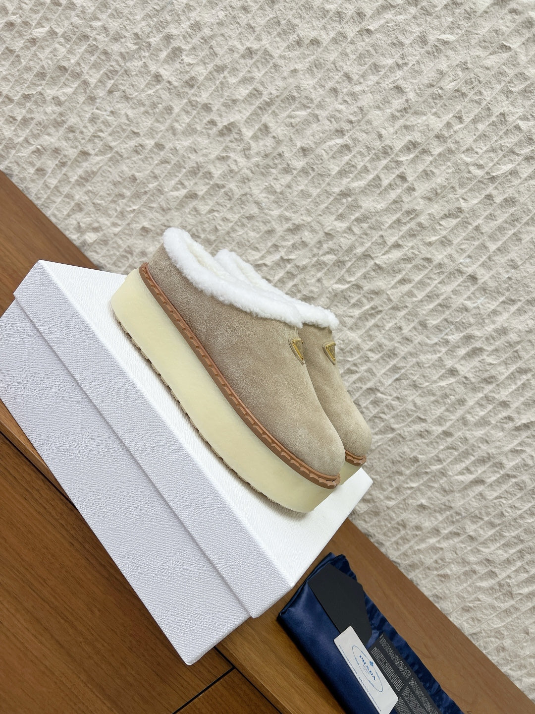 PRADA 25S PLATFORM FUR-LINED MULES IN WARM BEIGE SUEDE