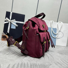 PRADA 25S RE-EDITION 1978 SMALL BACKPACK 28 IN BURGUNDY RE-NYLON