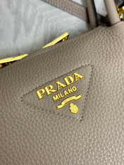 PRADA 25S SMALL BAG 23 IN TAUPE CALFSKIN GOLD HARDWARE