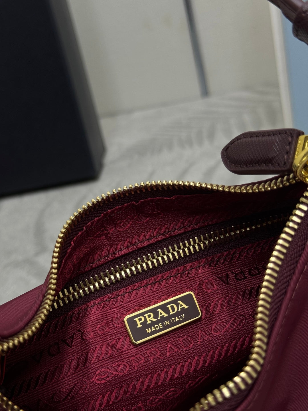 PRADA 25S RE-EDITION 2005 MINI BAG 22 IN BURGUNDY RE-NYLON AND SAFFIANO