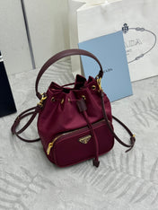 PRADA 25S DUET BUCKET BAG 23 IN BURGUNDY RE-NYLON GOLD HARDWRE
