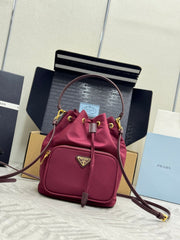 PRADA 25S DUET BUCKET BAG 23 IN BURGUNDY RE-NYLON GOLD HARDWRE