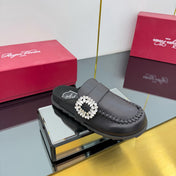 SLIDY VIV' MULES IN BLACK CALFSKIN