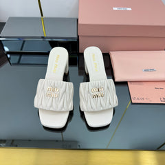 MATELASSÉ SLIDES PUMP IN OFF WHITE CALFSKIN