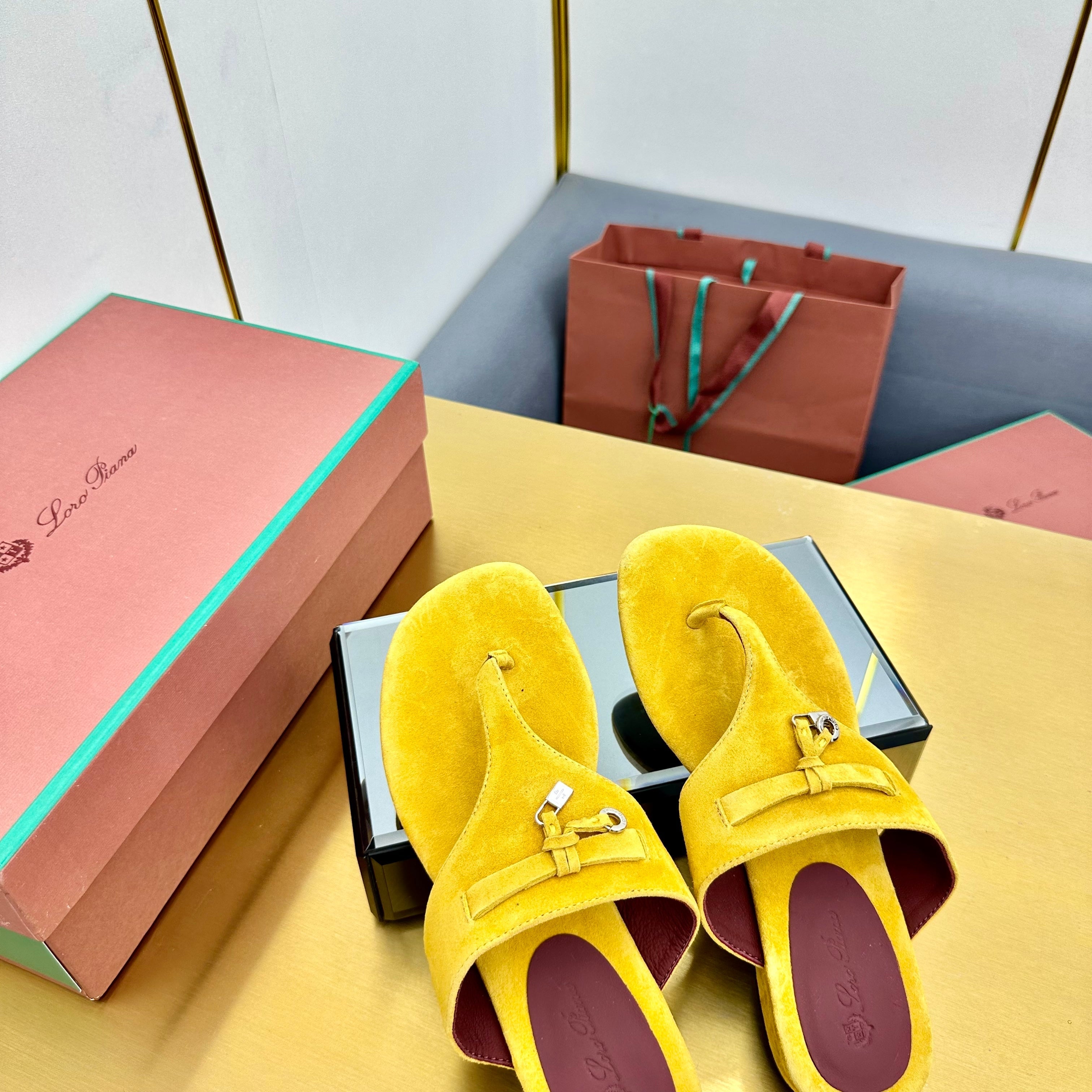 FLIP FLOPS IN YELLOW SUEDE AND HARDWARE SILVER