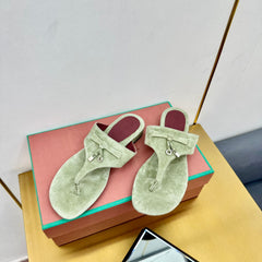 FLIP FLOPS IN GREEN SUEDE AND HARDWARE SILVER