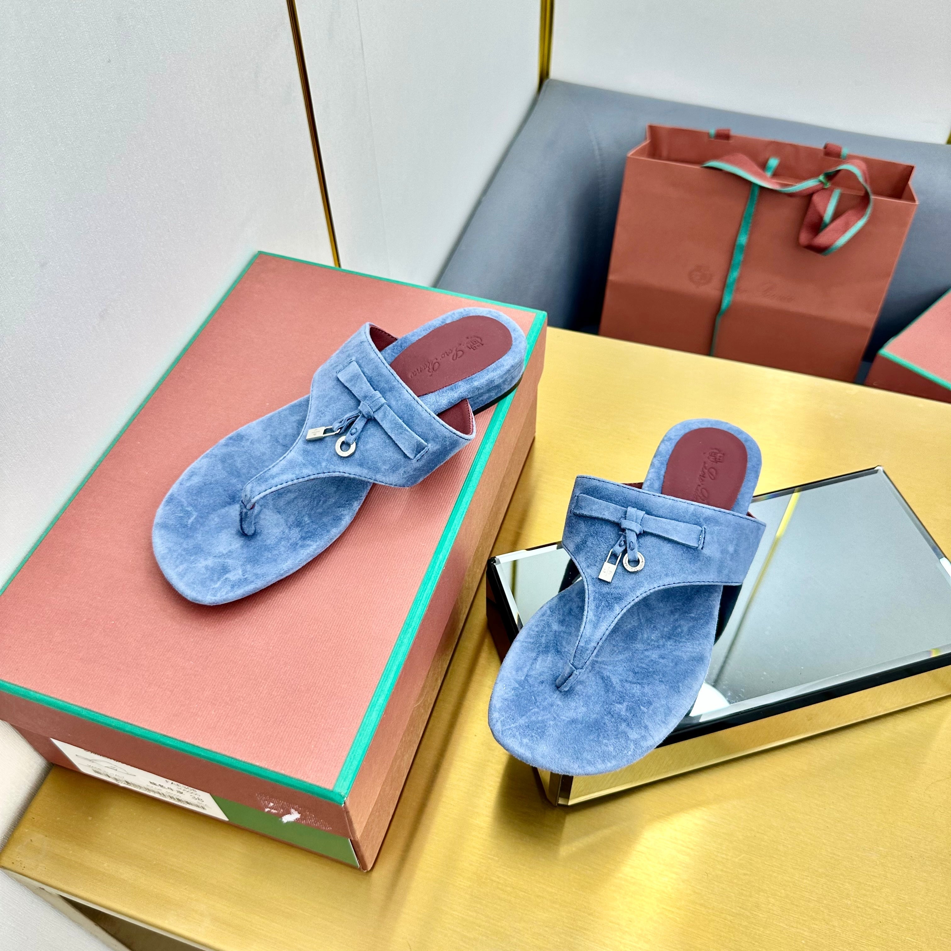 FLIP FLOPS IN BLUE SUEDE AND HARDWARE SILVER