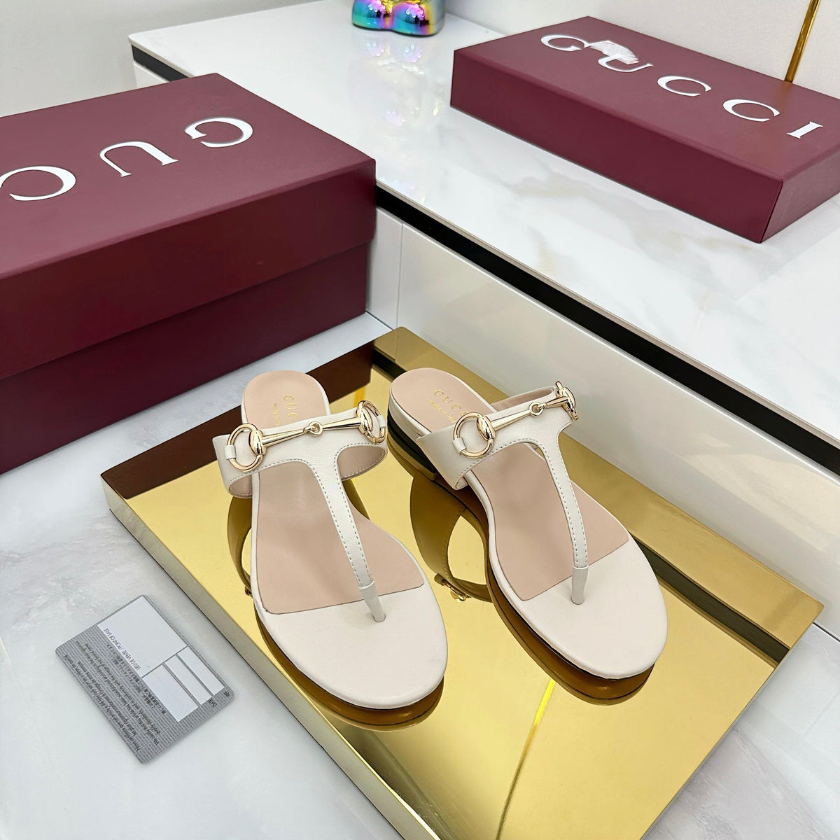 THONG SANDALS IN CREAM WHITE LAMBSKIN WITH GOLD HARDWARE