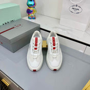 PRADA 25S CROSS LACED SNEAKERS IN WHITE CALFSKIN