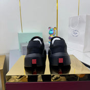 PRADA 25S CROSS LACED SNEAKERS IN BLACK CALFSKIN