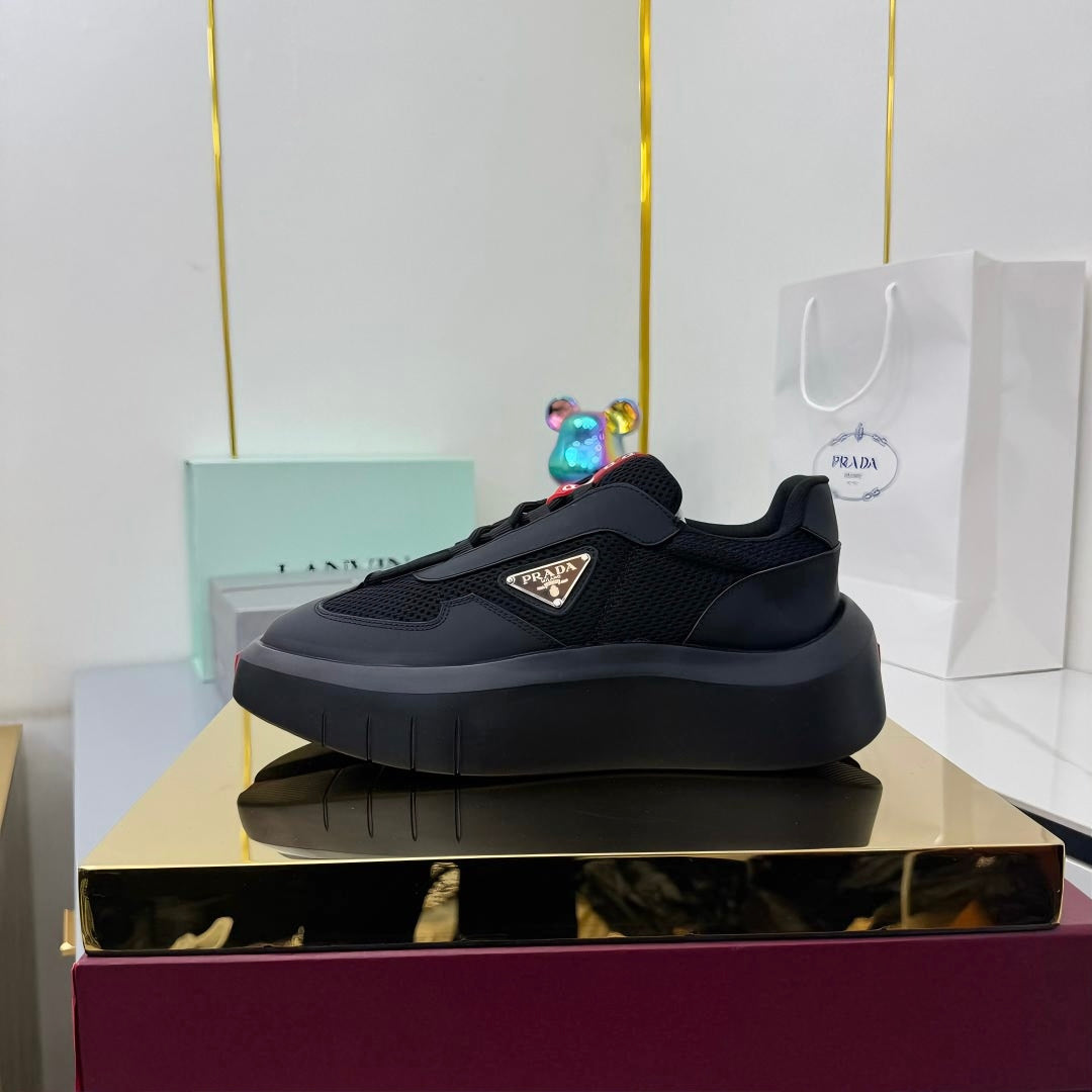 PRADA 25S CROSS LACED SNEAKERS IN BLACK CALFSKIN