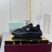 PRADA 25S SNEAKERS IN BLACK CALFSKIN
