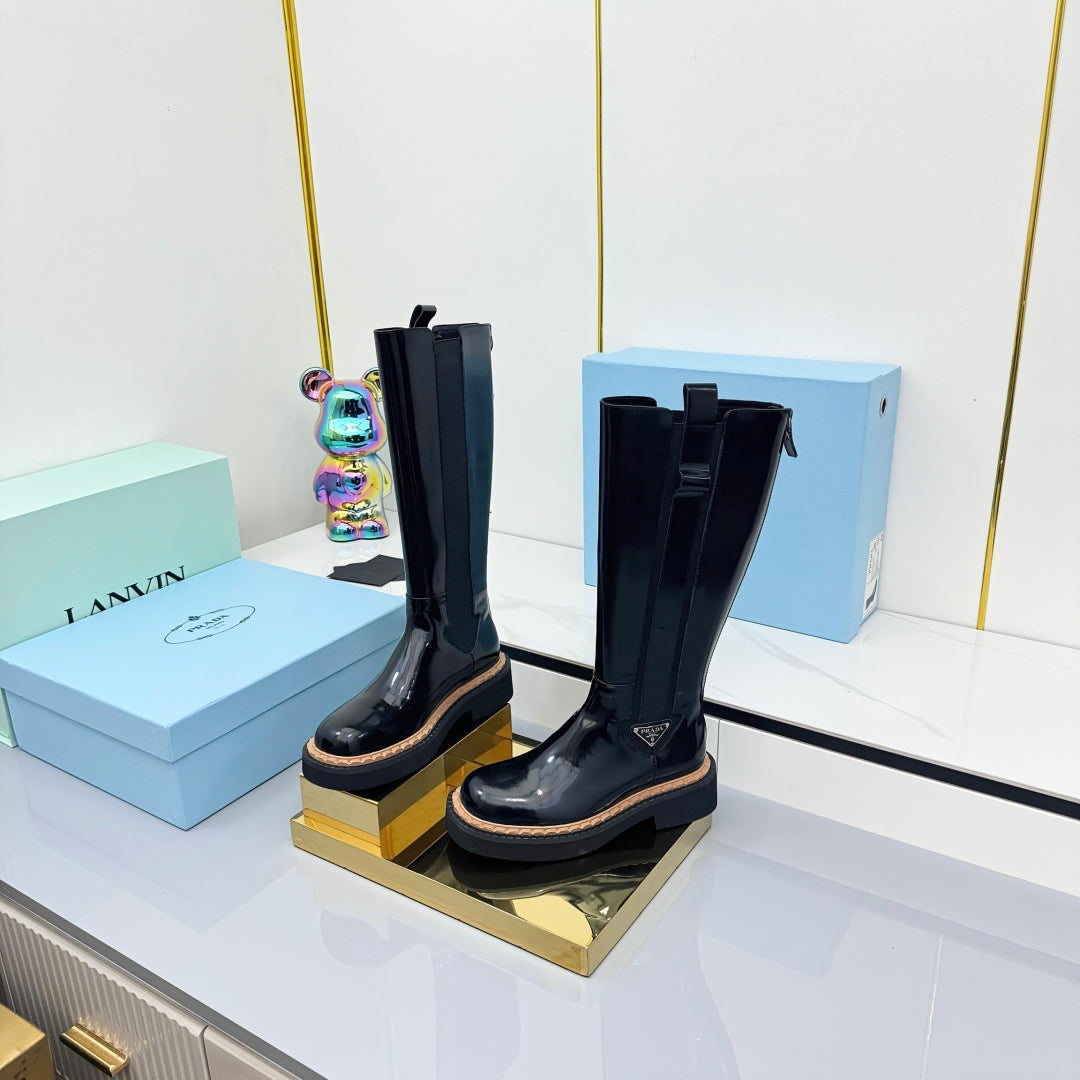 PRADA 25S TALL CHELSEA BOOTS 50MM IN BLACK GLOSSY CALFSKIN