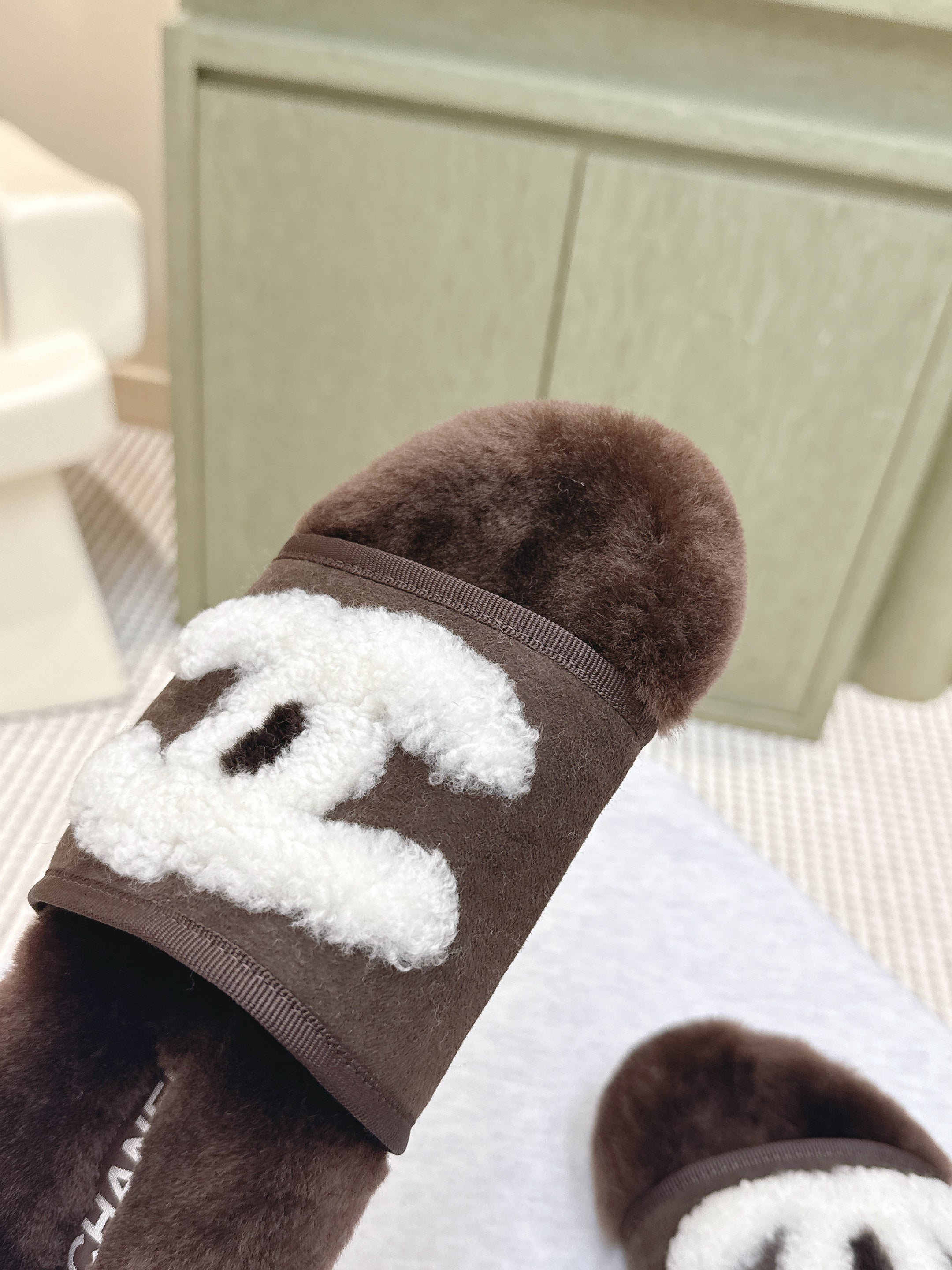 CHANEL 25S FUR SLIPPERS DOUBLE-LAYERED IN DARK BROWN WITH WHITE CC LOGO