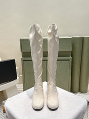 CHANEL 25S KNEE-HIGH BOOTS 60MM IN WHITE PATENT CALFSKIN WEDGE HEELS