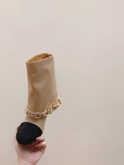 CHANEL 25S CALF-LENGTH BOOTS 45MM IN BEIGE AND BLACK CALFSKIN GOLD HARDWARE