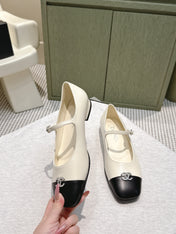 CHANEL 25S MARY JANE FLATS IN IVORY LAMBSKIN WITH BLACK CAP TOE SILVER HARDWARE