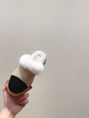 CHANEL 25S FUR-LINED MULES IN BEIGE AND BLACK SUEDE
