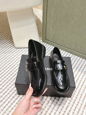 CHANEL 25S GODDESS FLAT LOAFERS IN BLACK PATENT CALFSKIN GOLD HARDWARE