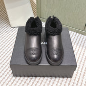 CHANEL 25S SHORT BOOTS IN BLACK CALFSKIN WITH SHEEPSKIN LINING