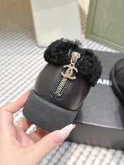 CHANEL 25S SHORT BOOTS IN BLACK CALFSKIN WITH SHEEPSKIN LINING