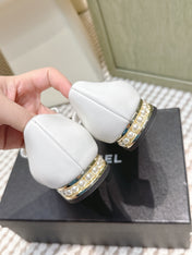 CHANEL 25S MARY JANE BALLET FLATS IN WHITE LAMBSKIN BLACK PATENT CAP TOE WITH BOW