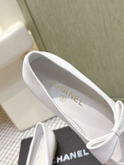 CHANEL 25S MARY JANE BALLET FLATS IN WHITE LAMBSKIN BLACK PATENT CAP TOE WITH BOW