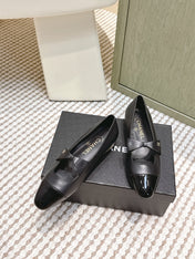 CHANEL 25S MARY JANE BALLET FLATS IN BLACK LAMBSKIN PATENT CAP TOE WITH BOW
